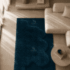 midnight-tide-deep-teal-monochrome-sculptural-shag-carpet (1)